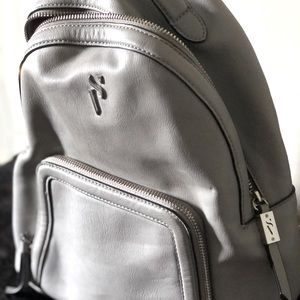 Vera Wang silver backpack. No stains no tears used once or twice.